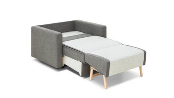 JOKA Magic Längsschläfer Sessel in Grau mit komplett ausgezogener Liegefläche auf weißem Hintergrund.